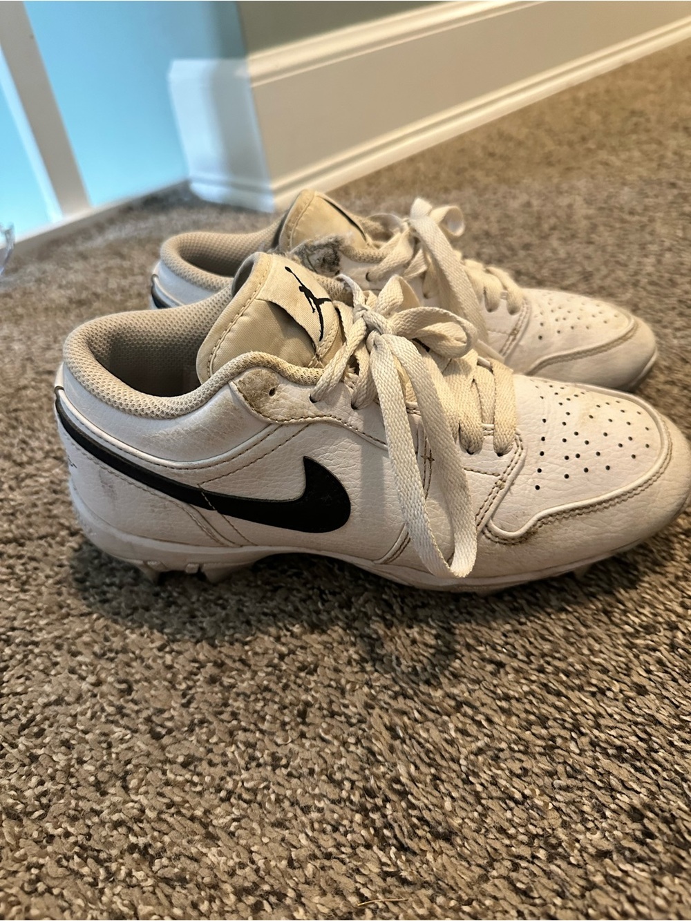 Nike Kids' Low-Top White with Black Swoosh football cleats